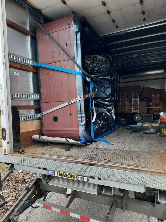 Hot tub strapped upright inside a moving truck (Hot Tub Moving services) by Affordable Moving Solutions of Ohio