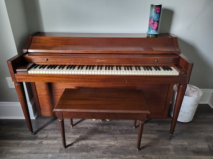 Upright piano with bench (Piano Moving Services) by Affordable Moving Solutions of Ohio