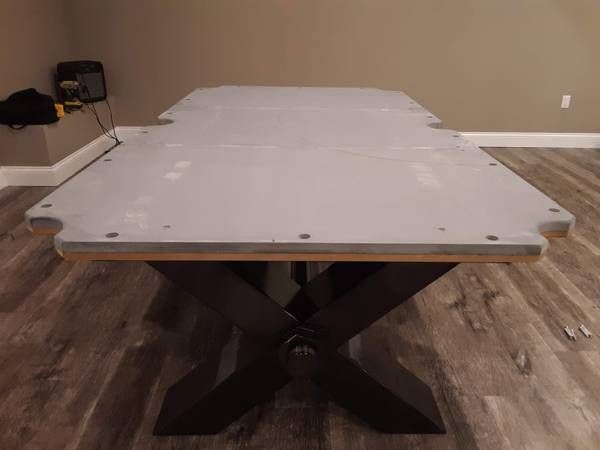 Pool table slate set on the frame (Pool Table Moving Services) by Affordable Moving Solutions of Ohio